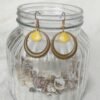 Boucles d'oreilles pupille jaune
