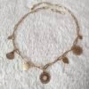 Collier doré breloques soleil rose